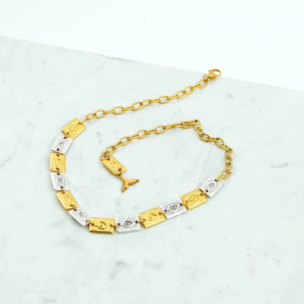 Collier Matia - Symbole de Protection et de Charme Méditerranéen  Plongez dans l'essence vibrante de la culture méditerranéenne avec notre Collier Matia, une œuvre d'art artisanale qui fusionne élégance contemporaine et tradition ancienne. Conçu avec soin par nos artisans expérimentés, ce collier est orné du célèbre "Matia" ou Œil Grec, reconnu pour sa capacité à protéger contre le mauvais œil et à apporter bonheur et chance.